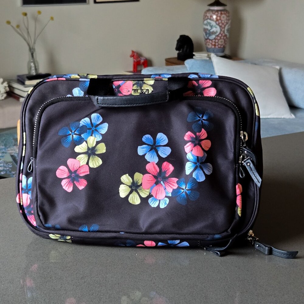 TUMI hanging, expandable cosmetic toiletry travel bag,